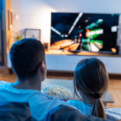 young-couple-watch-film-at-romantic-night-in-apartment-and-eat-popcorn.jpg_s=1024x1024&w=is&k=20&c=dpUKCxP0aqRsPF5ilZcLwN-RLizWtVIZBtj3-JfvZyU=